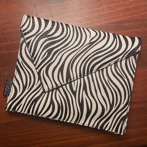 Zebra print clutch • REDKEN 5th Ave NYC •